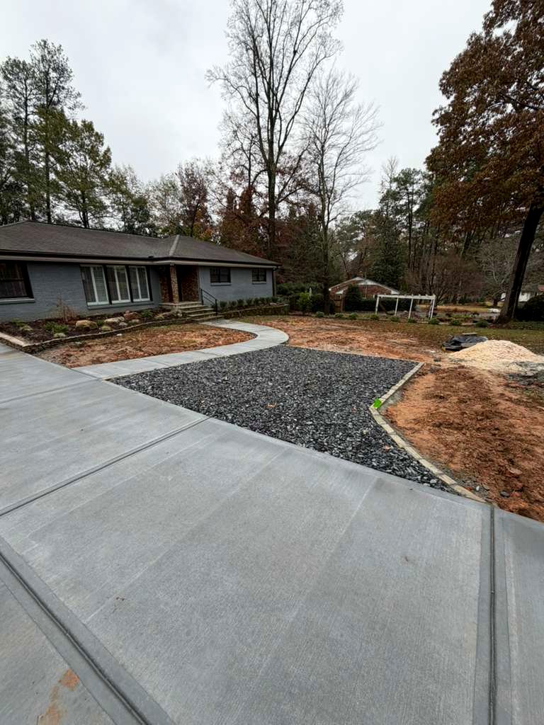 Tucano Stones - Concrete driveway with slate chip parking pad and curved walkway - Atlanta GA