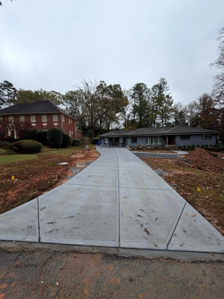 Tucano Stones - New concrete driveway full view from street - Atlanta GA