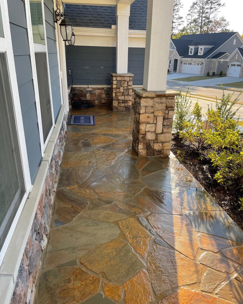 Flagstone porch and stack stone columns.