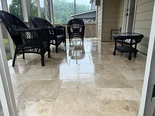 Ivory buff Travertine flooring at screened porch.