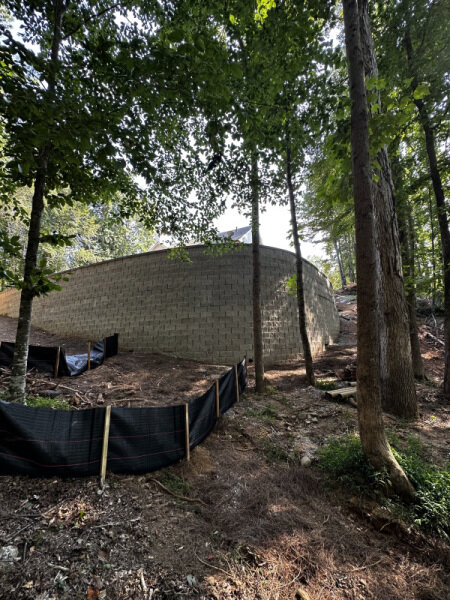 Flattering the backyard with retaining wall in Roswell, GA