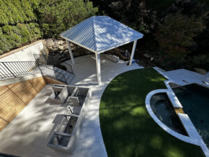 Tucano Stones Backyard and pool area with porcelain pavers