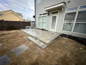 Tucano Stones Elevated paver patio with retaining wall block